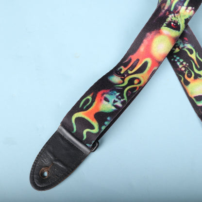 Detailed view of the stitched leather end tab and button slot.