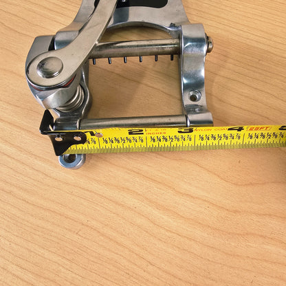 Tape measure across the front roller bar showing a width of approximately 3 1/4 inches.