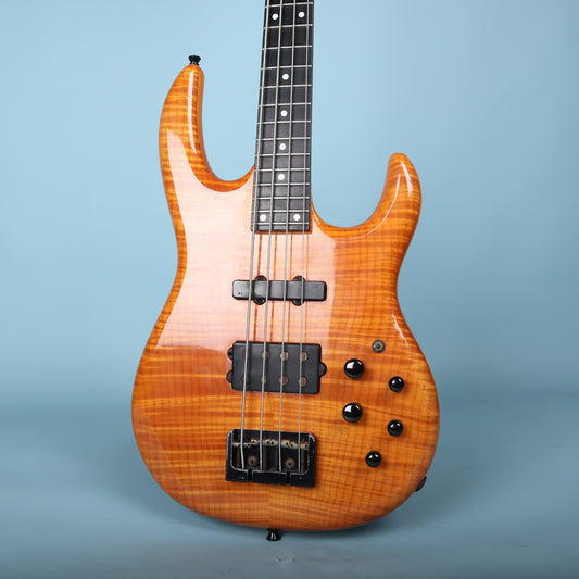 Front view of the Carvin LB70 bass body featuring a flame maple top in amber finish.