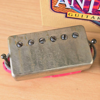 Top view of Seymour Duncan Antiquity neck humbucker pickup with aged nickel cover