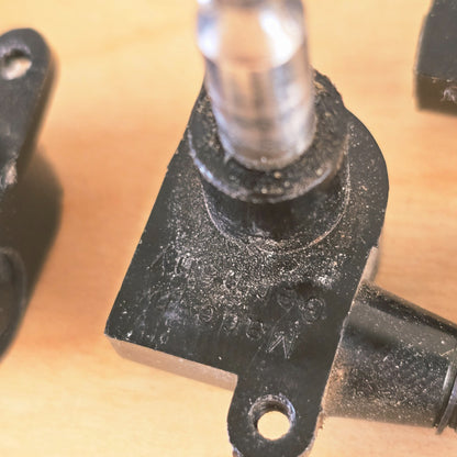Close-up of Made in Germany stamp on the reverse of a tuning machine housing