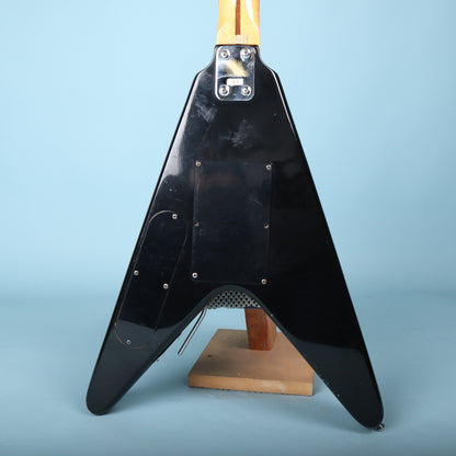 Back view of the black V-shaped body and neck plate.