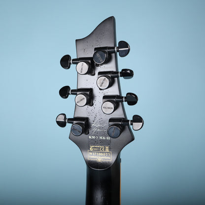 Rear of the headstock showing Keith Merrow logo, KM-7 MK-II designation, serial number, and locking tuners