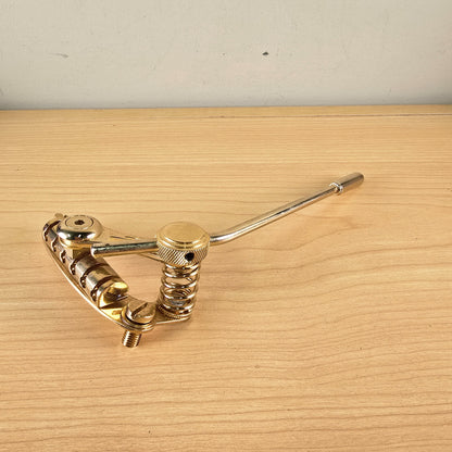 Side perspective of Duesenberg Les Trem II in gold finish with tremolo bar attached