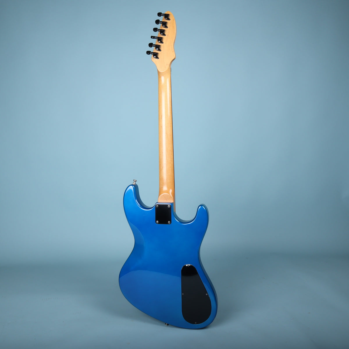 Full rear view of the guitar highlighting the bolt-on neck and contoured body