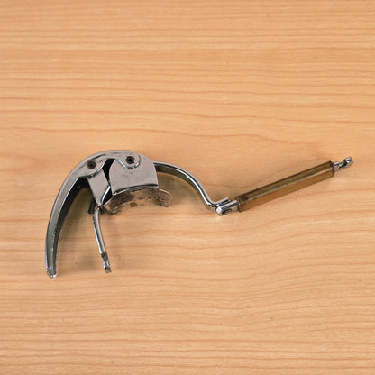 Underside angle of the open Hamilton KB19A capo showing the neck rest pad.