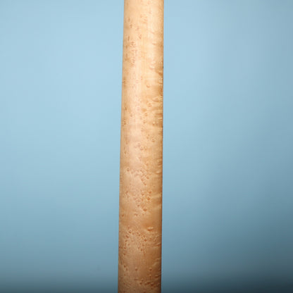 Rear view of birdseye maple guitar neck shaft.