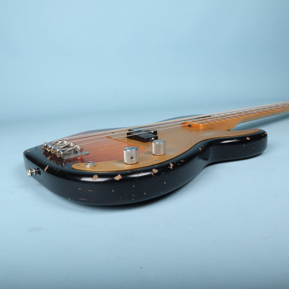 Side view of the lower bout highlighting knurled chrome control knobs and input jack.