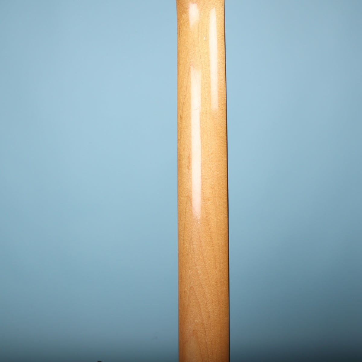 Back of the maple neck showing smooth wood grain
